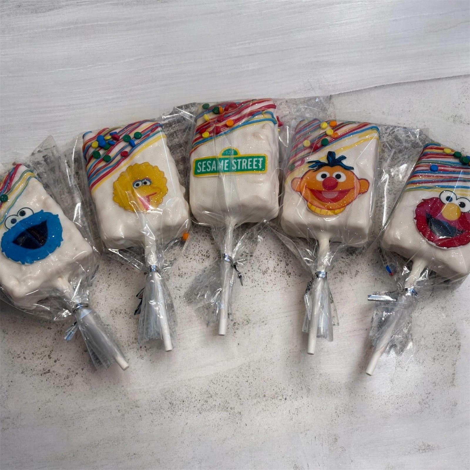 Sesame Street chocolate-dipped rice krispie pops