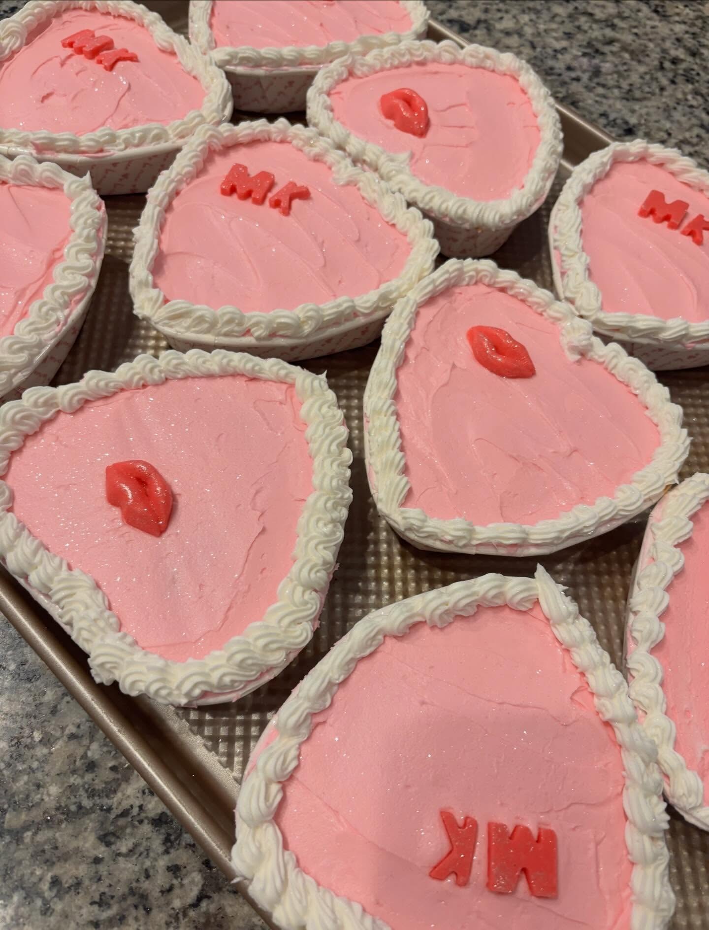 Pink mini heart cakes with fondant details